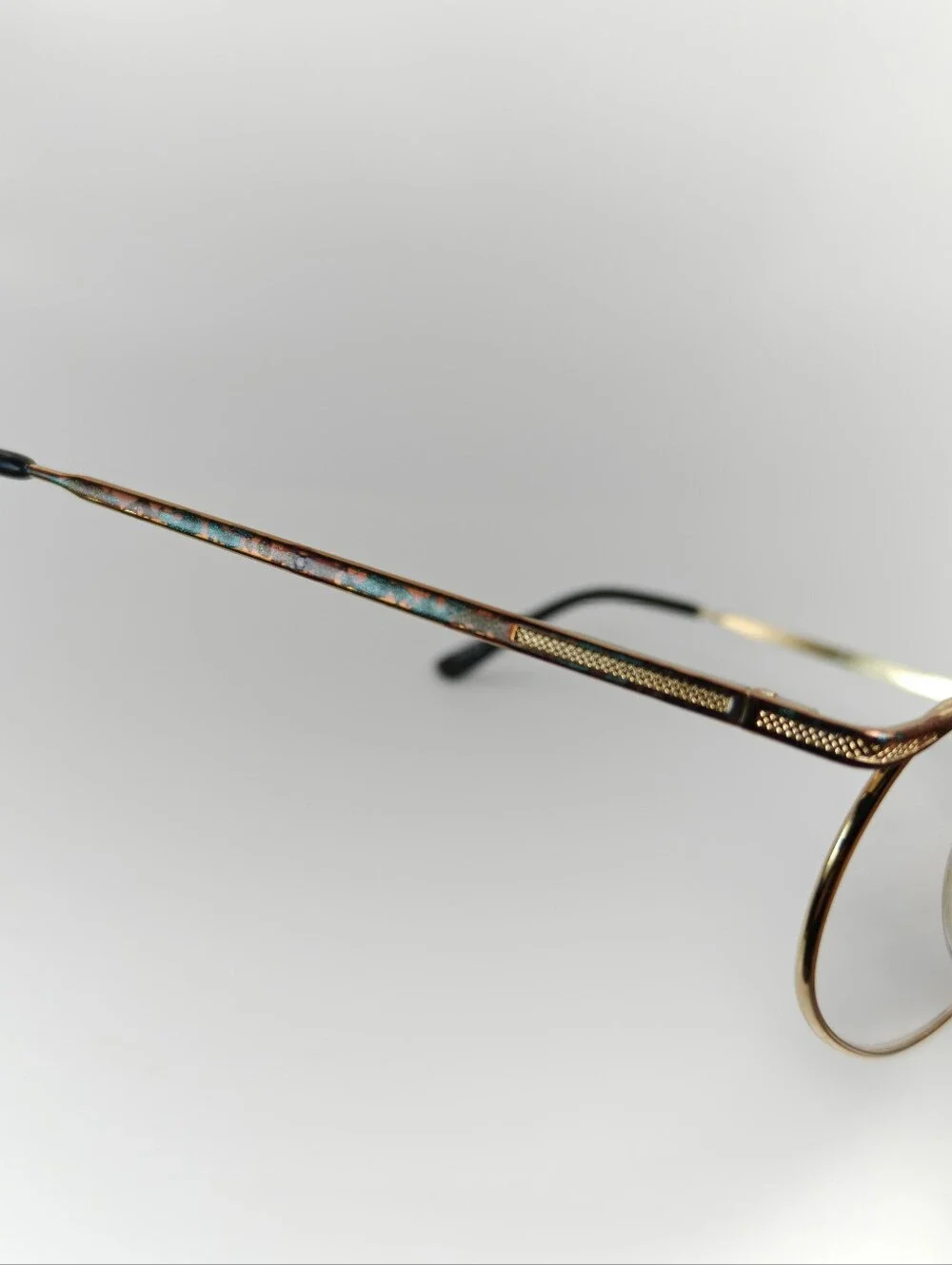 Manola Odo Frames Round Gold-Tone. Glasses with Subtle Copper Weathered Patina.